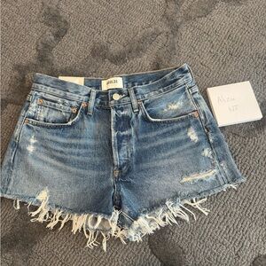 Agolde Medium Blue Distressed Denim Shorts with Frayed Hem